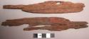 Wood fragments, thin and slightly paddle shaped