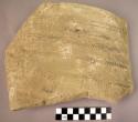 1 large potsherd with incised decoration