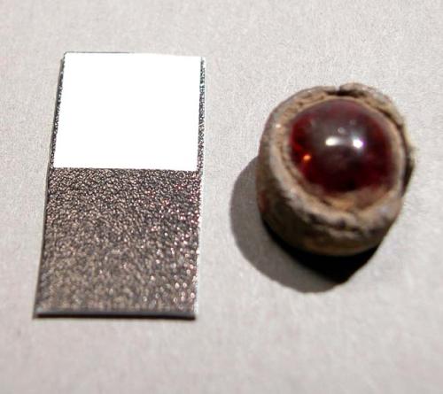 Gems (garnets?) one silver mounted