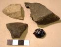 Stone fragments (hammerstones?)