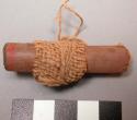 Ceremonial reed cigarette with "apron" attached