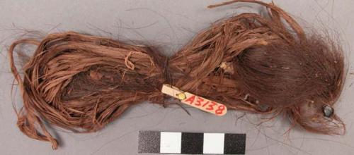 Bundle of human hair and cedar bark