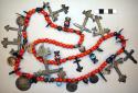 Necklace of coral beads, trade beads, and silver ornaments