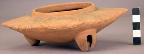 Pottery dish, boat-shaped, tripod