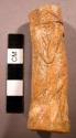 Bone tube with anthrpomorphic carving