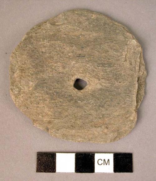 Slate disc, thin, perforated, edges broken