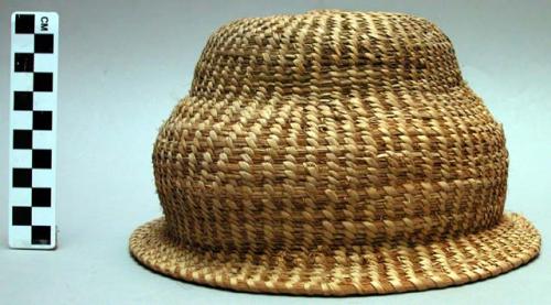 Coiled basketry hat with narrow brim