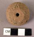 Pottery spindle whorl with punctate and colored designs