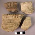 11 incised rim potsherds