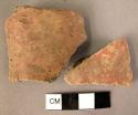 2 miscellaneous potsherds of red painted ware