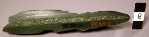 Polished stone implement, jadeite?