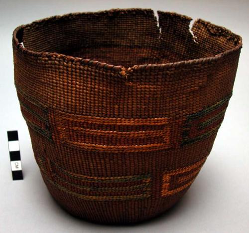 Small basket - oblong design of yellow, green, tan on dark ground