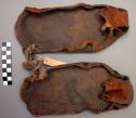 Pair of sandals called jota, made of ox-hide with modern steel knife +