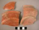 7 Sherds (red glaze- unstratified)