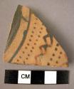 Sherd of painted pottery - goemetric design.