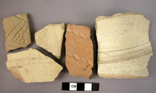 Ceramic body sherds, buff and gray wares, incised and impressed designs