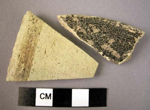 Ceramic rim and body sherd, fine greenish grey ware w. black painted stripes