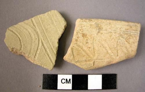 Ceramic rim and body sherd, white ware, wheelmade, incised