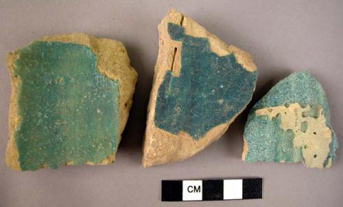 7 glazed blue potsherds