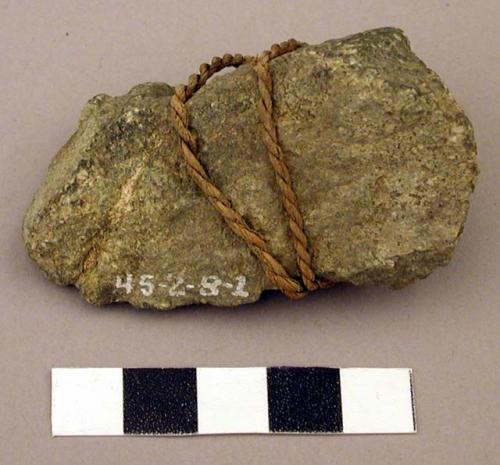 Raw material, unmodified rock tied with twine