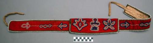 Belt pouch of red trade cloth, with blue, clear white, and pink bead decoration