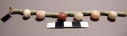 Beads, various tubular faience, natrolite pendants, 1 carnelian pendant