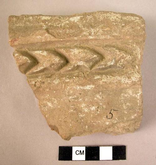 Potsherd - light brown; coarse, thick, brown to light brown, medium fired