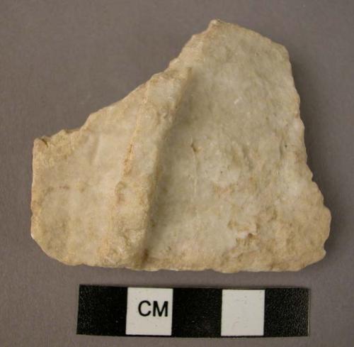 Ground stone vessel fragment, raise band, alabaster?