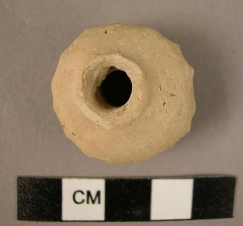 Baked clay whorl