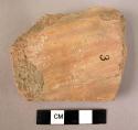 Potsherd - seems to be thick application of finer clay to surface which is then