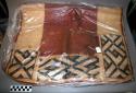 Textile of woven raffia
