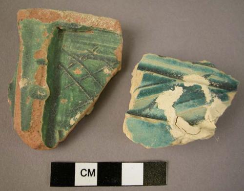 Ceramic sherds, deep blue glaze, raised and cut out geometric designs