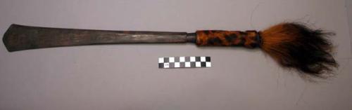 Iron knife - leopard skin and ram's mane ornamented handle (sek njel)