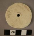 Baked clay perforated disc