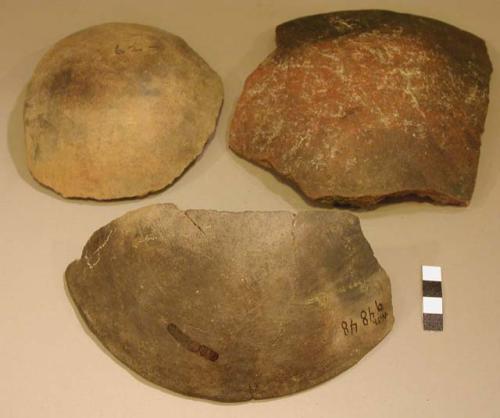Ceramic rim and body sherds, undecorated redware, burnt
