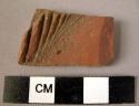 Potsherd - red painted and relief (A1)