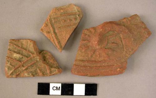 3 potsherds - red molded ware