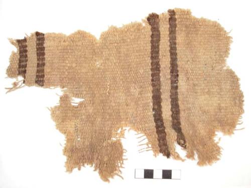 Organic woven fiber textile fragment, tan w/ brown stripes.