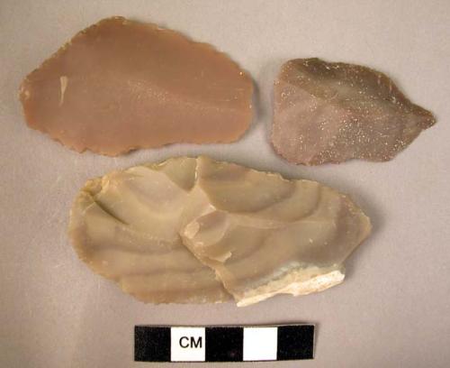 3 flint blade-like flakes showing signs of use