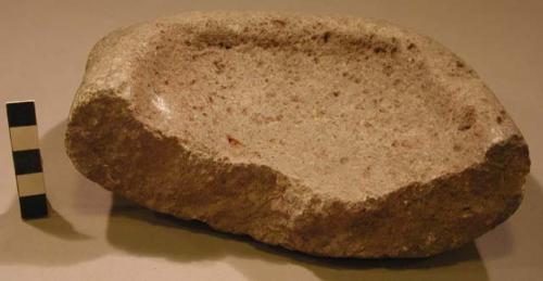 Stone dish, projecting corners