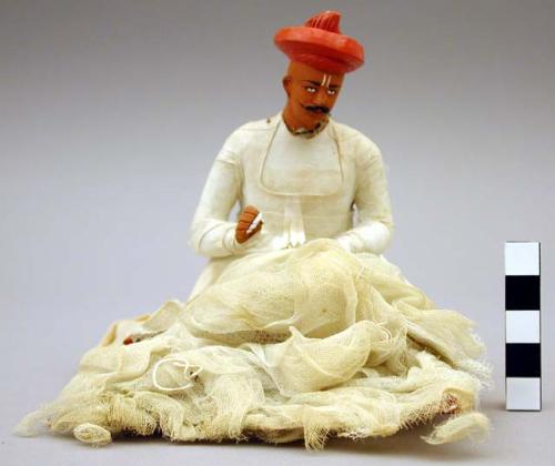 Figurine, seated male, Hindu tailor