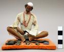 Figurine, seated male, madrasee shoemaker