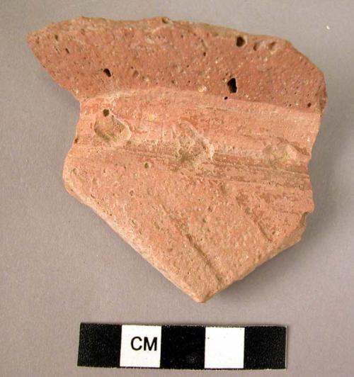 1 potsherd with impressed decoration