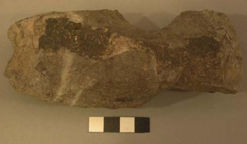 Notched stone axe