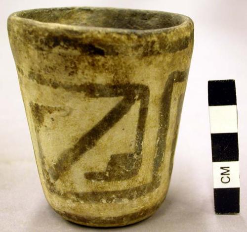 Black-on-white pottery crucible