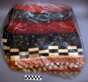 Textile of woven raffia cloth