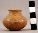 Miniature rounded-bottom pottery vase