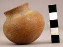 Miniature rounded-bottom polychrome pottery vessel