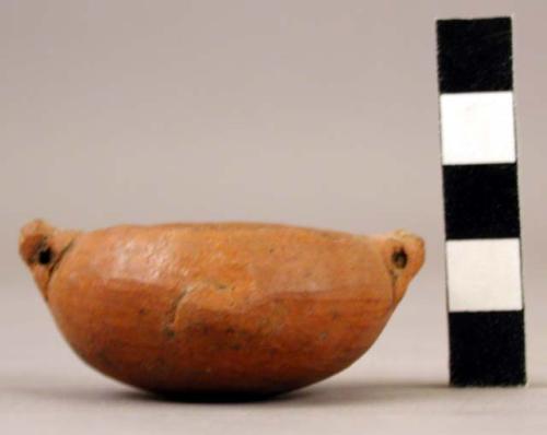 Miniature rounded-bottom pottery bowl