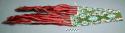 Wide beadwork belt with fringes of red and pink wool